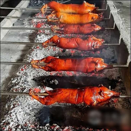 奎松市拉洛马烤猪的价格因配料价格的增加而随之上涨，拉洛马被称为“菲律宾...