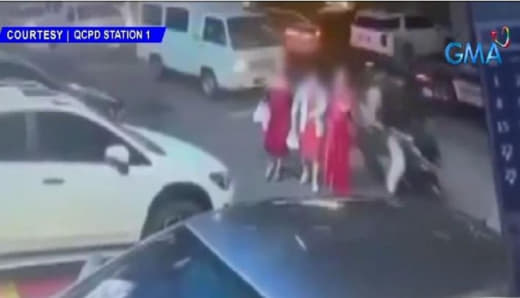 奎松市一女性遇抢包，被摩托车拖行数十米