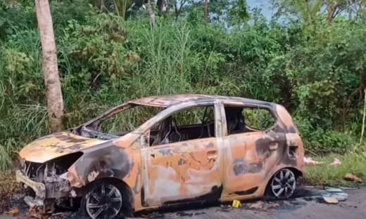 菲律宾莱特省(Leyte)Merida镇一辆火烧车内发现一名头部受枪伤...