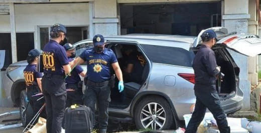 菲律宾卡加鄢德奥罗市(CagayandeOro)警方在枪杀案发生后的不...